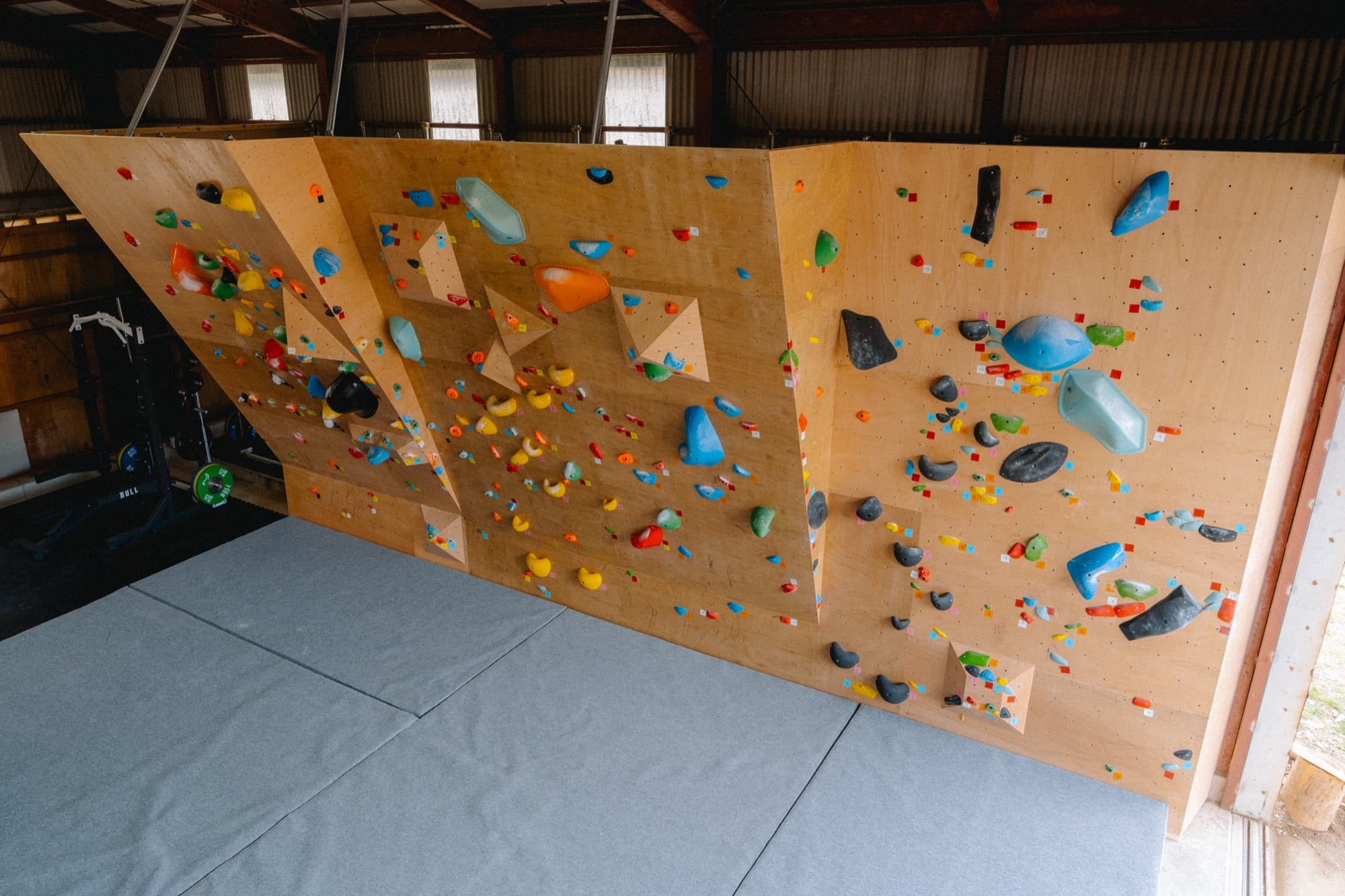 Close-up of bouldering wall showing 90, 110 and 120 degree angles